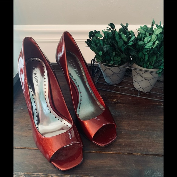 BCBG Patent Leather Peep Toe
Heels, Ruby Red Pumps, Sandals - Picture 4 of 5